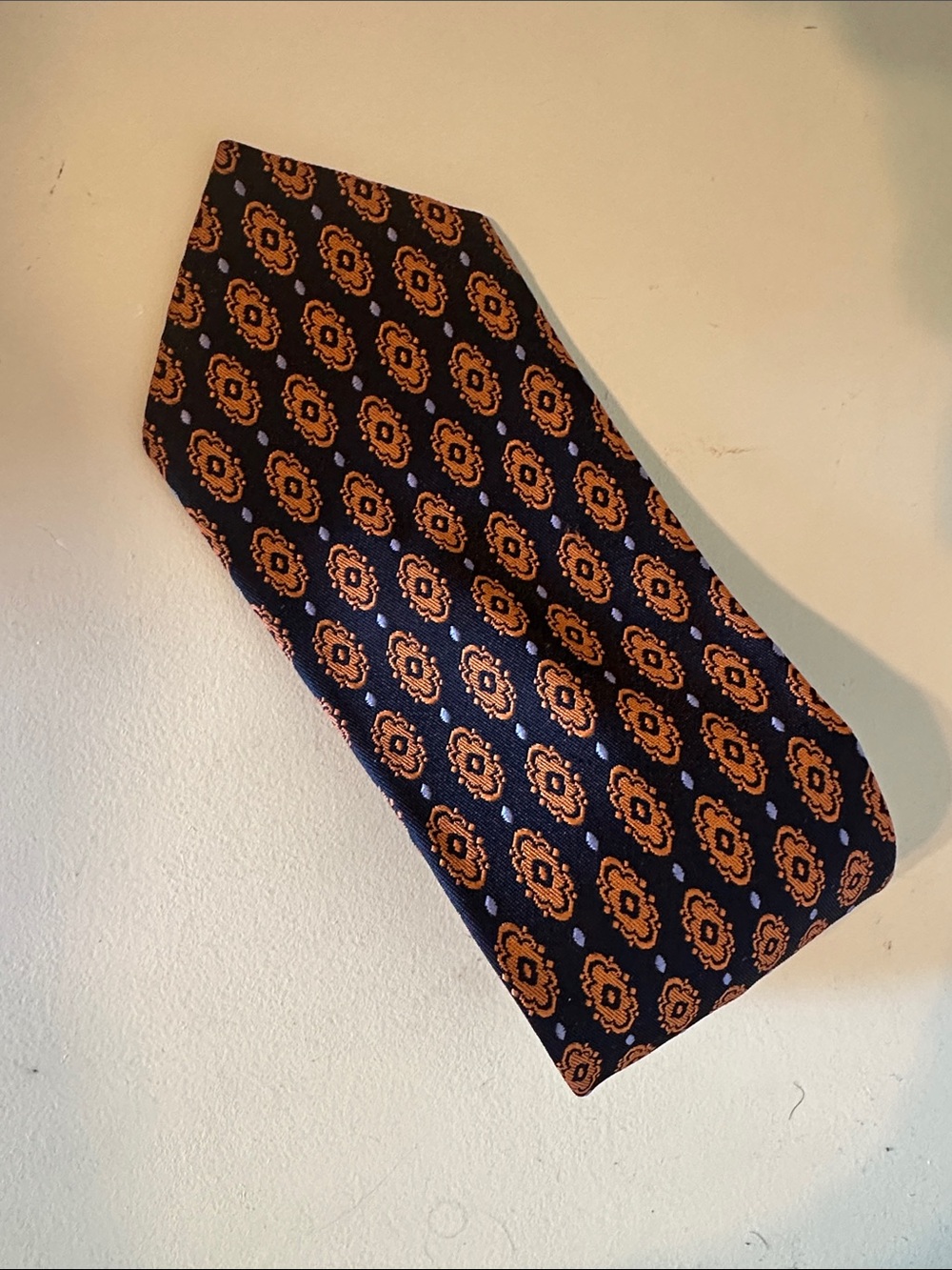 Men's Navy Blue Tie with Orange Medallion Pattern